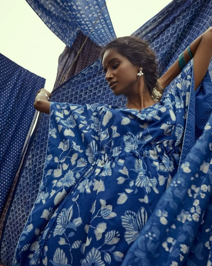 Woman wearing blue printed kurta from Vrikaa ethnic fashion collection